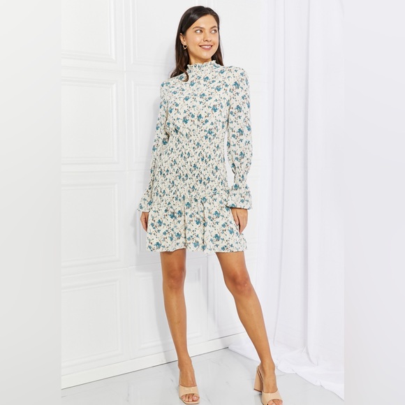 Floral smocked mini dress. - Picture 2 of 5